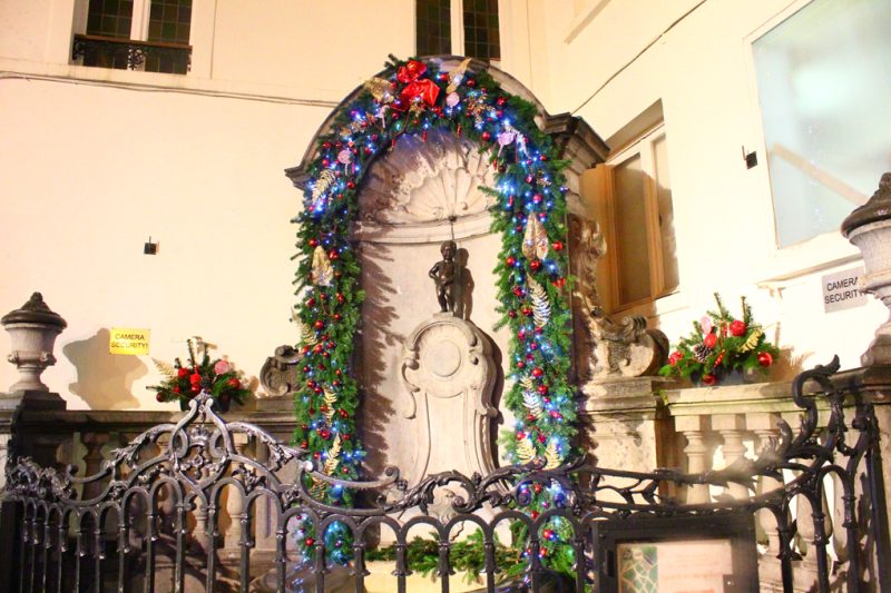Decorated fountain Manneken Pis Brussels